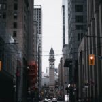 Capture of Toronto's urban street with the historic Old City Hall clock tower.