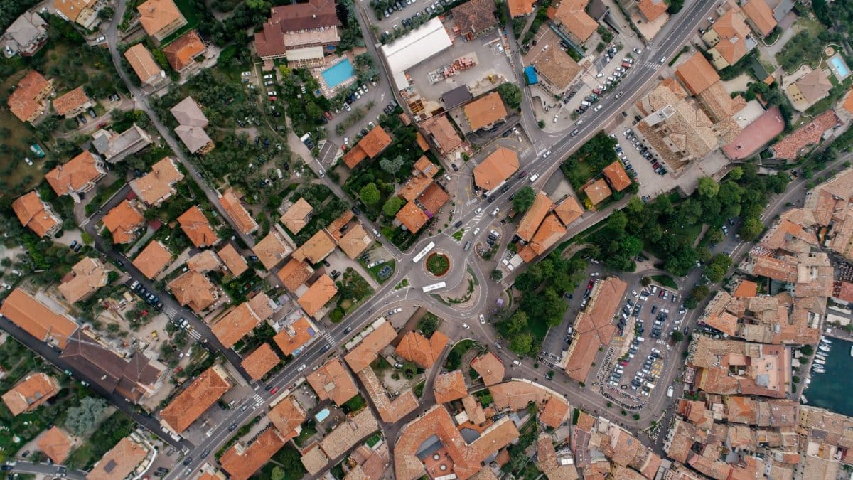 Stunning high-angle aerial photo showcasing a European city's intricate street layout and architecture.
