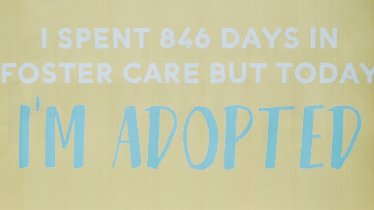 Inspirational message highlighting adoption after foster care journey.