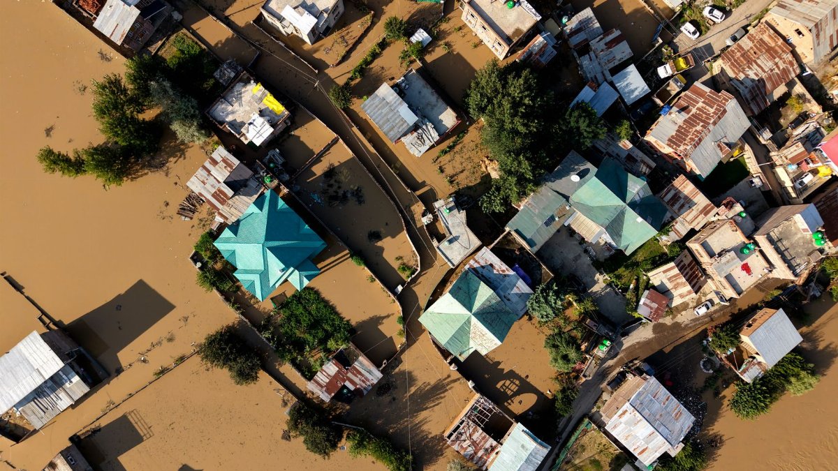 Drone photo capturing flooding in a residential area in Kashmir.