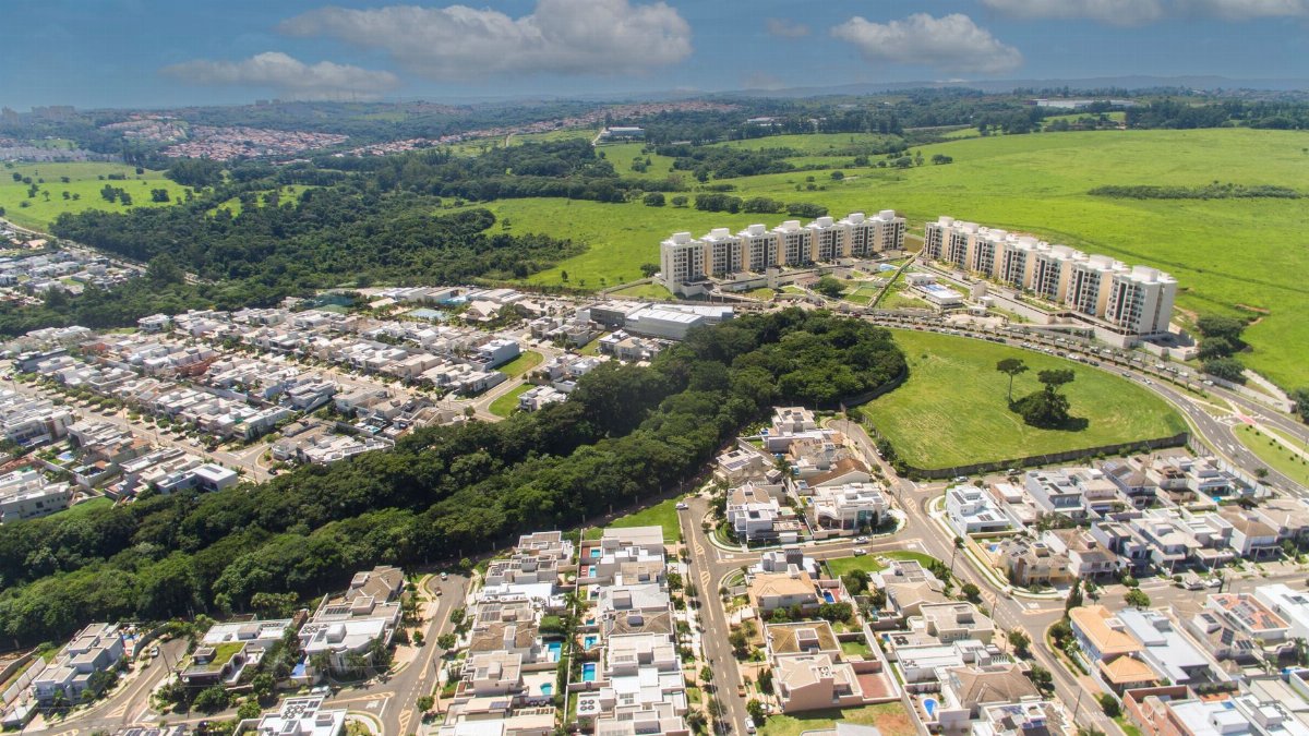 Aerial view of Campinas, SP, Brazil showcasing suburban and green landscapes.