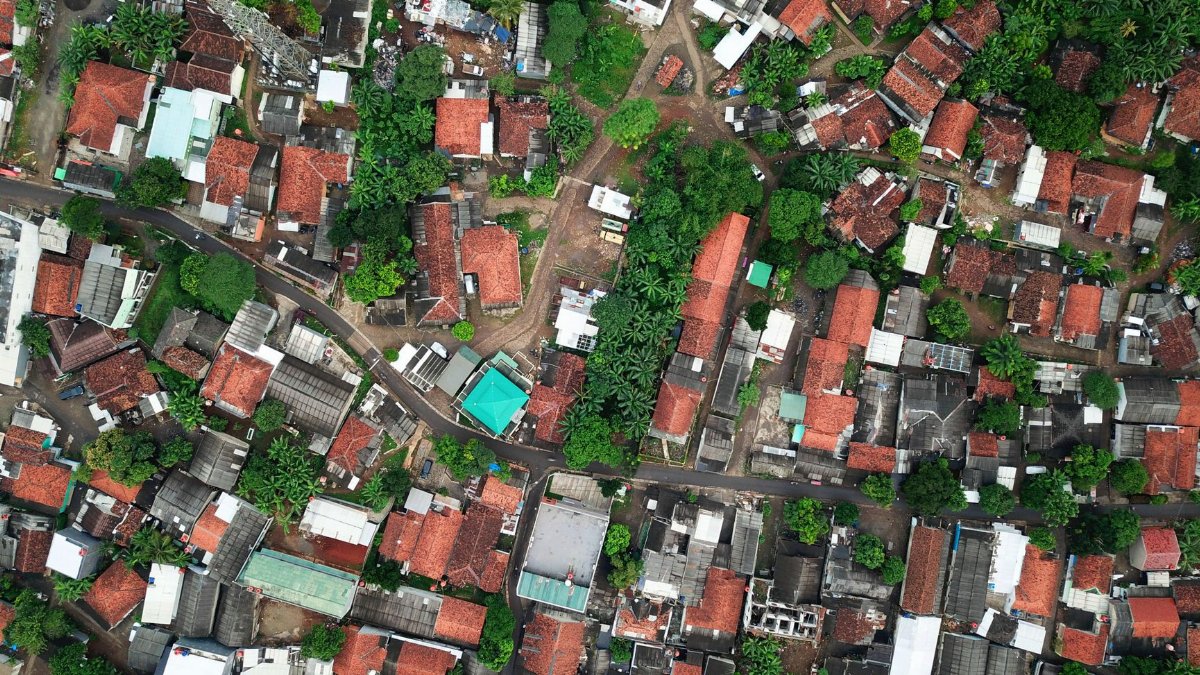 Aerial view of homes and greenery in Serpong, Indonesia, showcasing urban architecture.