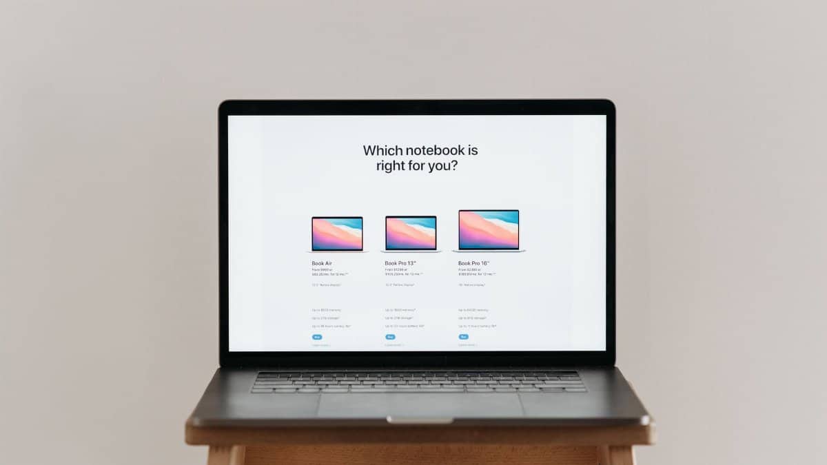 An open laptop on a wooden stool showing a notebook comparison chart, ideal for tech-focused imagery.