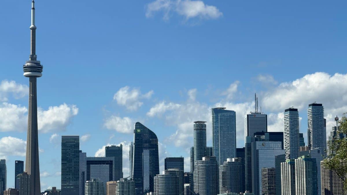 Beautiful view of Toronto's skyline featuring the iconic CN Tower on a clear day.