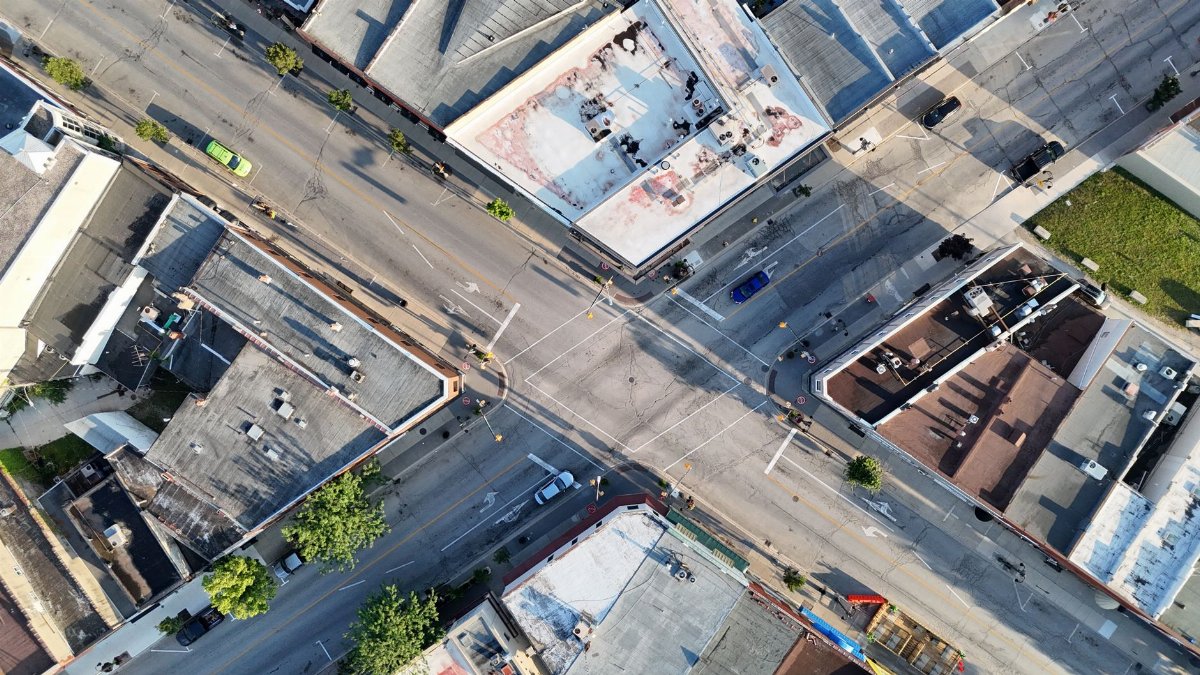 Aerial view of a city intersection in Ontario, Canada featuring buildings and roads.