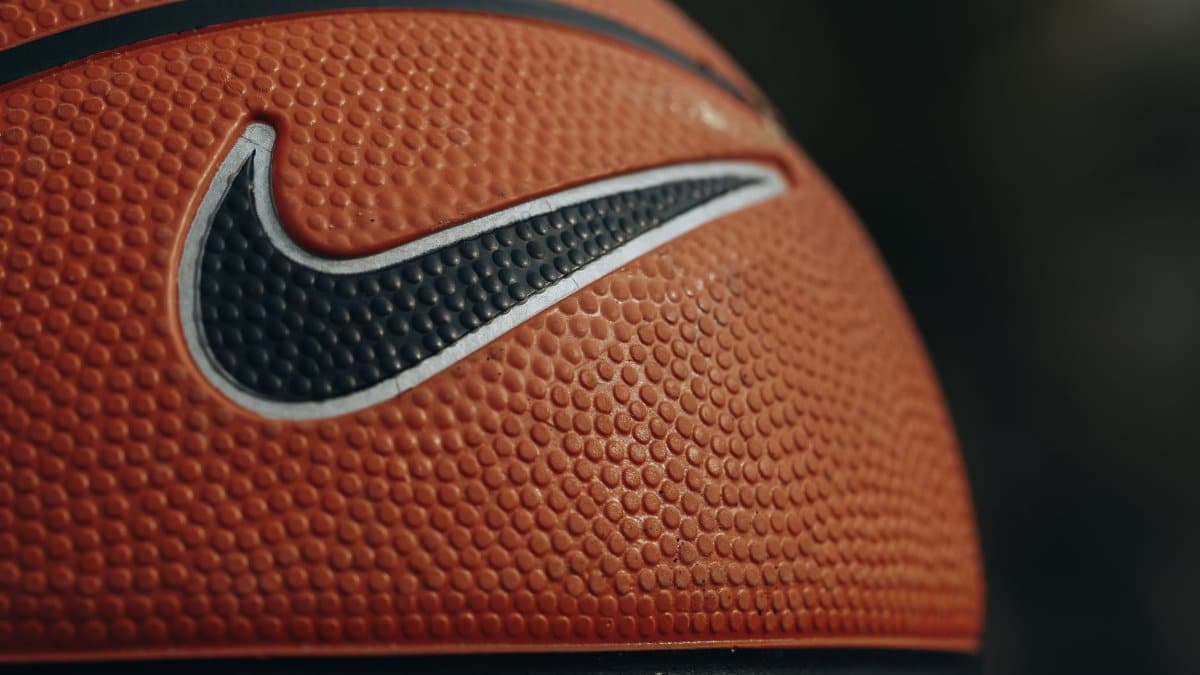 Detailed close-up shot of a basketball showing texture and brand logo.