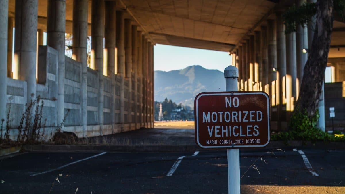 Photo of an underpass with a 'No Motorized Vehicles' sign in Marin County.