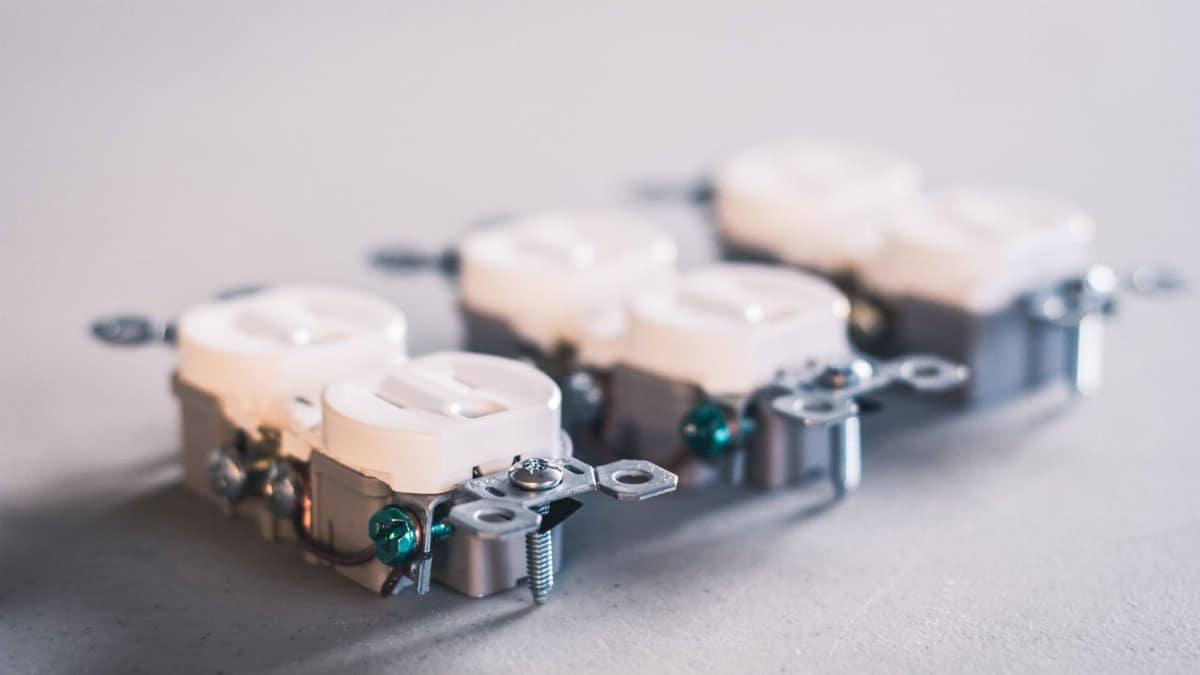 A detailed close-up of electrical outlets. Perfect for construction and electrical use themes.