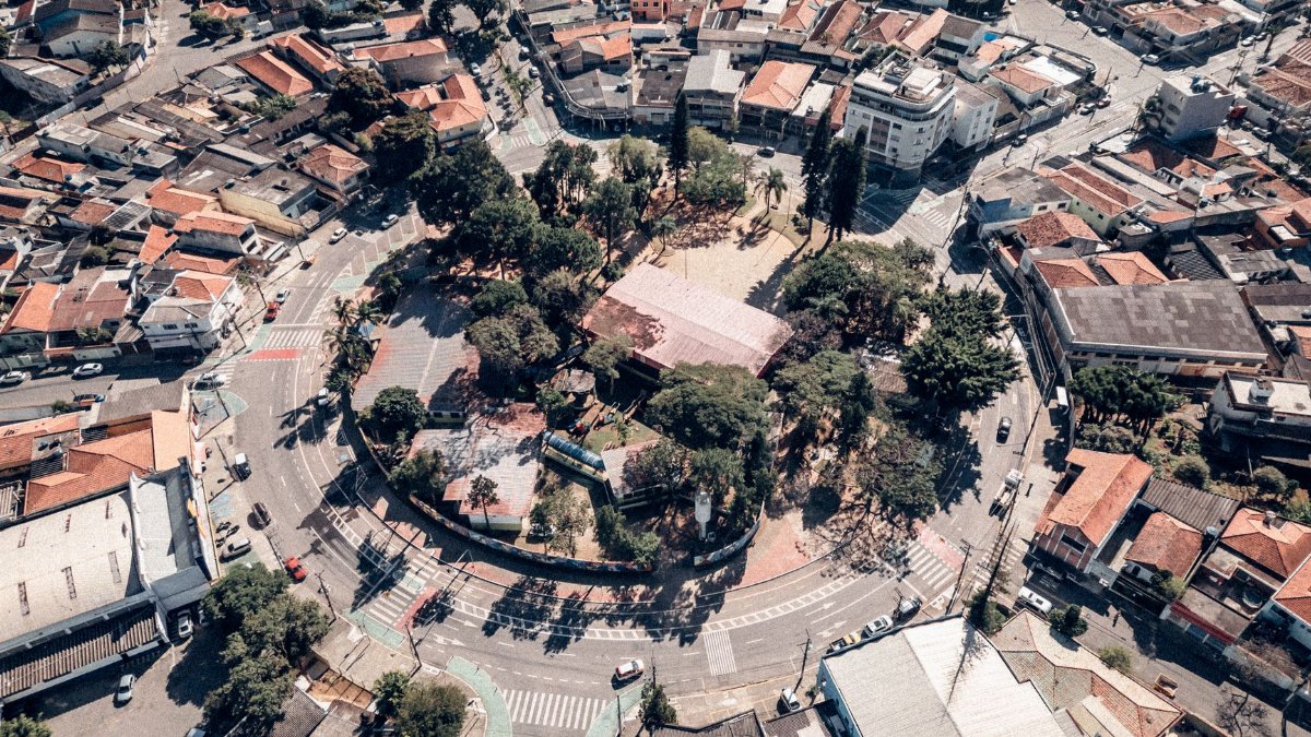Aerial view of the circular park surrounded by urban buildings in Jardim Vila Galvao, Sao Paulo.