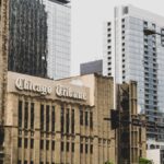 Chicago Tribune Tower with surrounding modern skyscrapers in downtown Chicago.