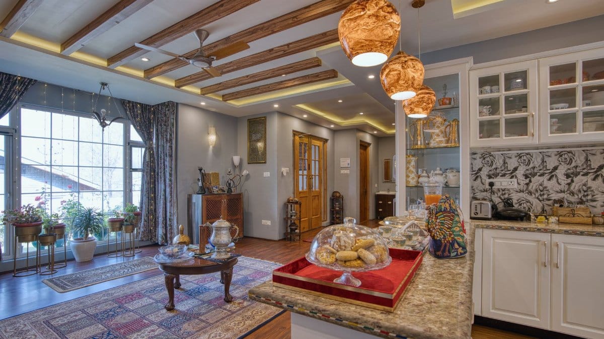 Explore the elegant and cozy living space featuring modern decor and warm lighting in Jammu and Kashmir.
