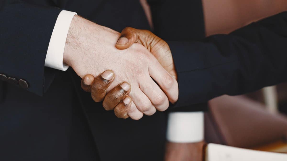 Close-up of a professional handshake symbolizing partnership and agreement.