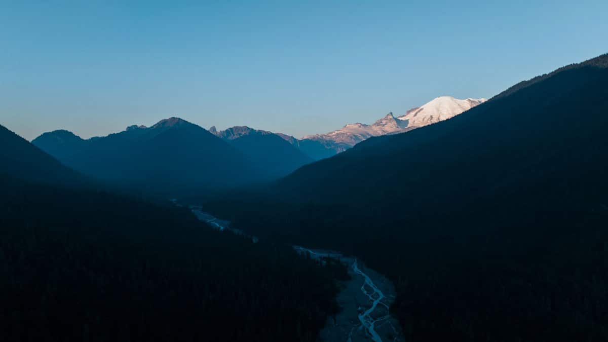 Stunning aerial view of Enumclaw mountains and river in Washington State during daylight.