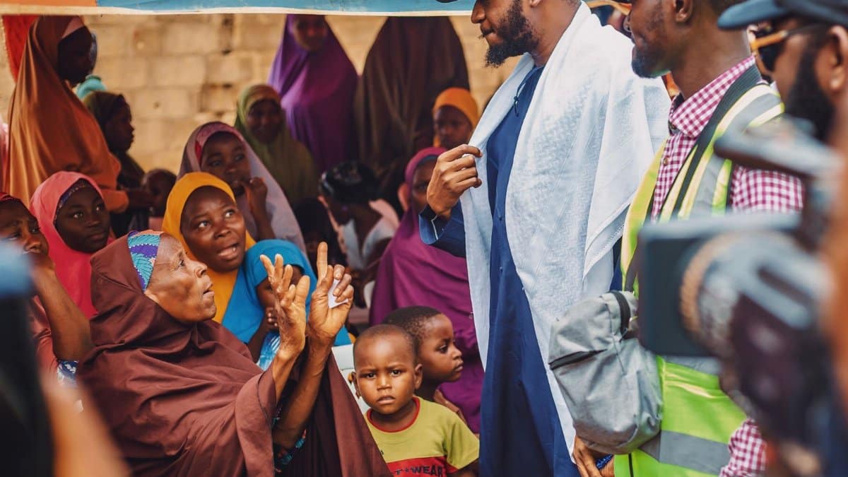 Vibrant outdoor Nigerian community gathering in Kaduna showcasing local engagement.