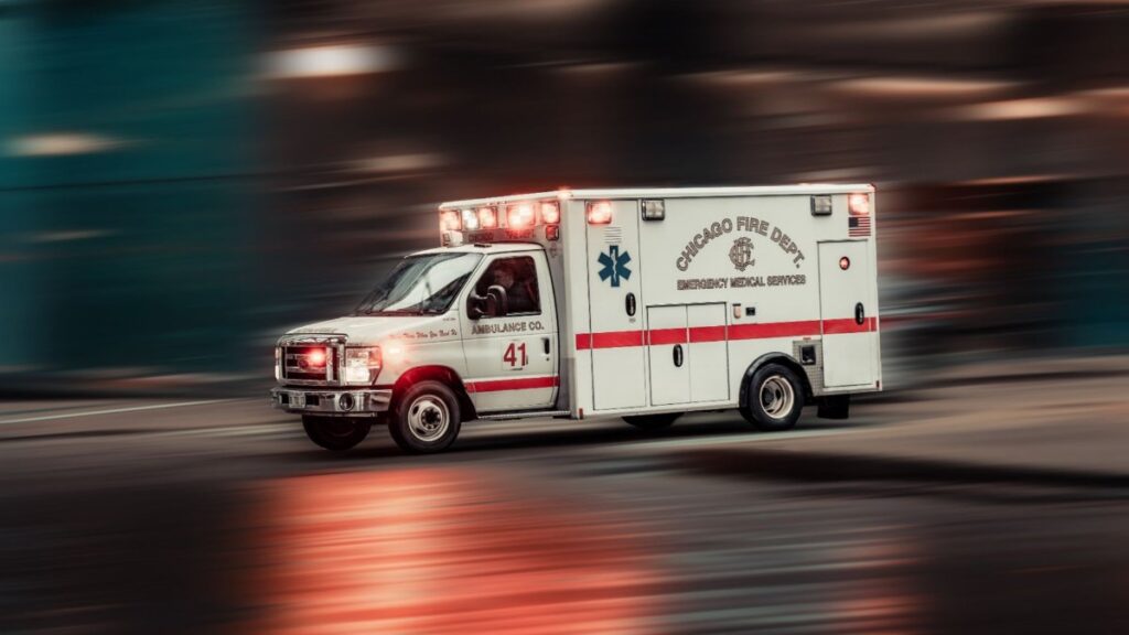 Dynamic capture of a Chicago Fire Dept ambulance rushing through city streets.