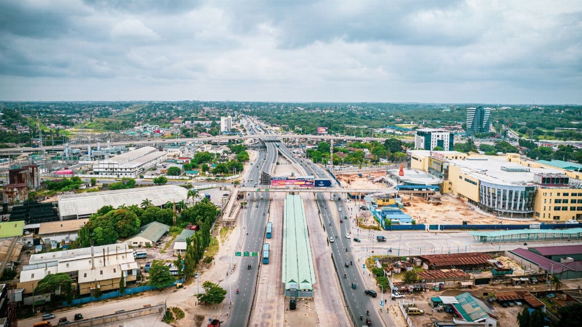 A vibrant aerial view of Dar es Salaam showcasing urban roads and infrastructure. Perfect for travel and city-life themes.