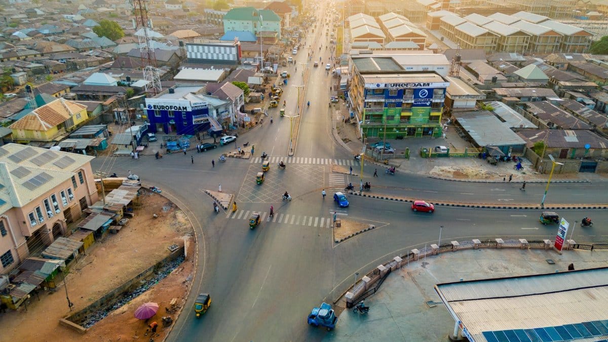 Stunning aerial capture of a bustling intersection in Kaduna, Nigeria during the day.