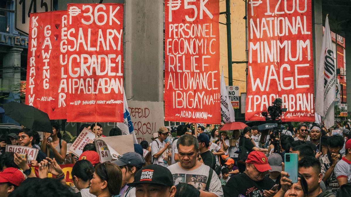 Demonstrators in Metro Manila demand higher wages and economic relief in a public protest.
