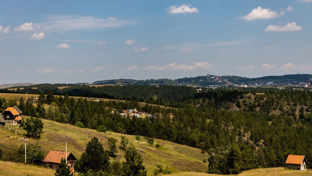 Peaceful landscape of wooded hills and distant horizon in Zlatibor, Serbia.