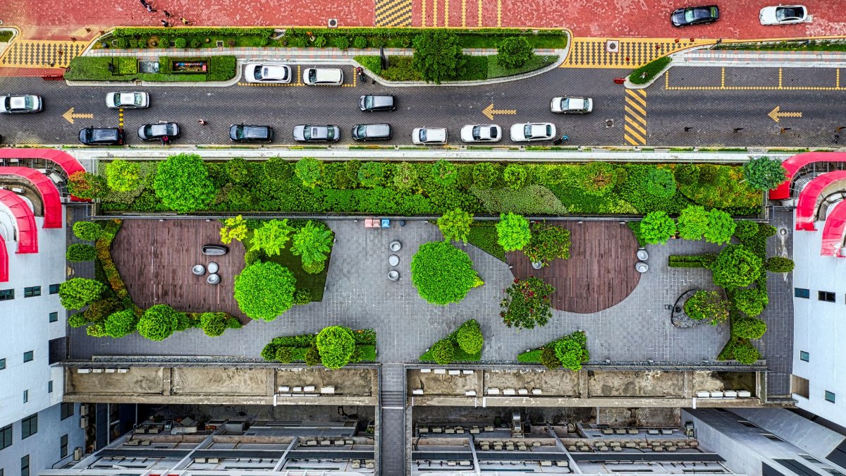 Aerial view of a lush green rooftop garden in Petaling Jaya, Malaysia. Urban architecture meets nature.