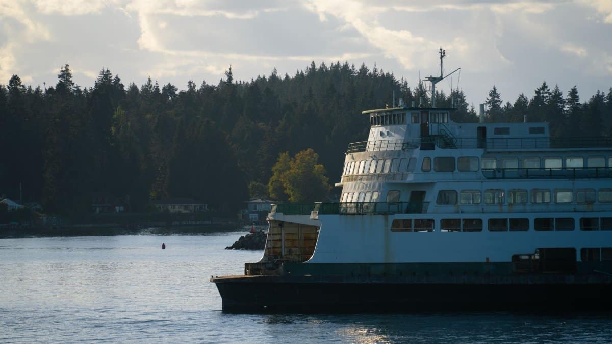 A classic Washington State ferry navigating the tranquil waters of Puget Sound.
