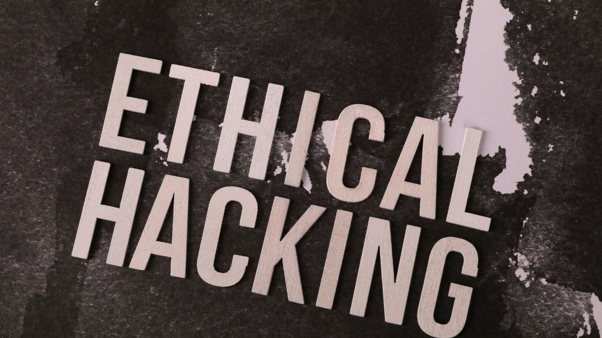 Conceptual image showing the words 'Ethical Hacking' on a textured abstract background.