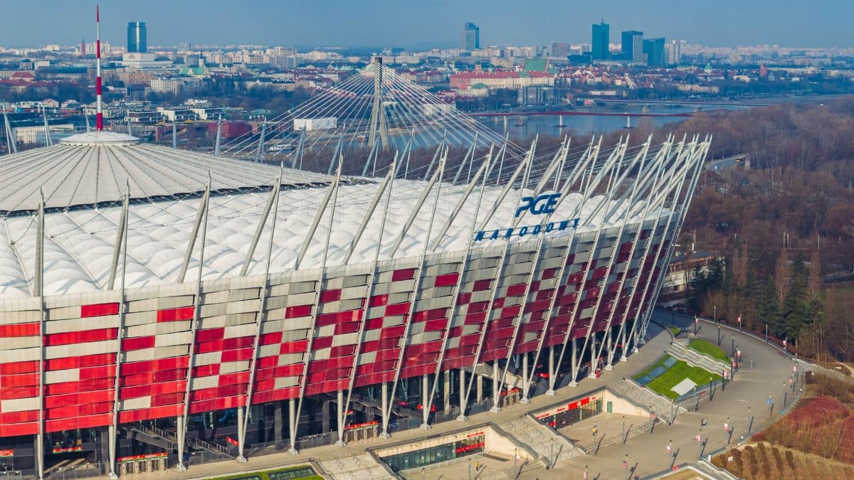 Stunning aerial shot of PGE Narodowy, showcasing Warsaw's iconic sports stadium and cityscape.