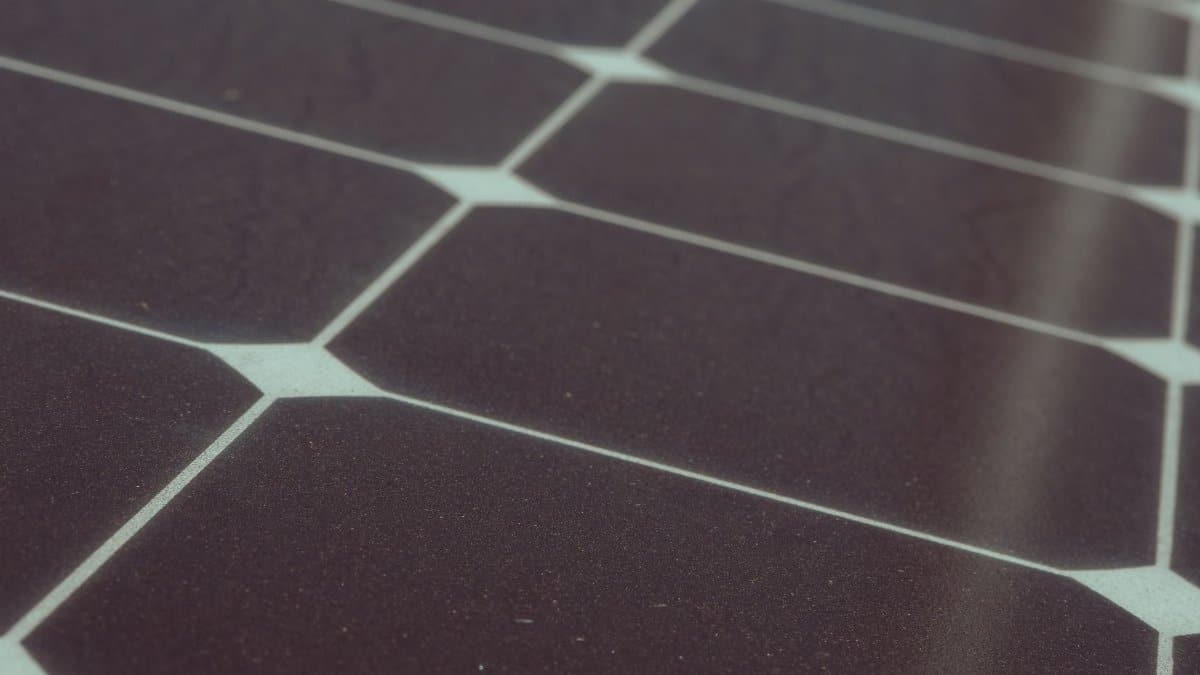 Detailed view of solar panel cells for alternative energy generation and innovation in technology.