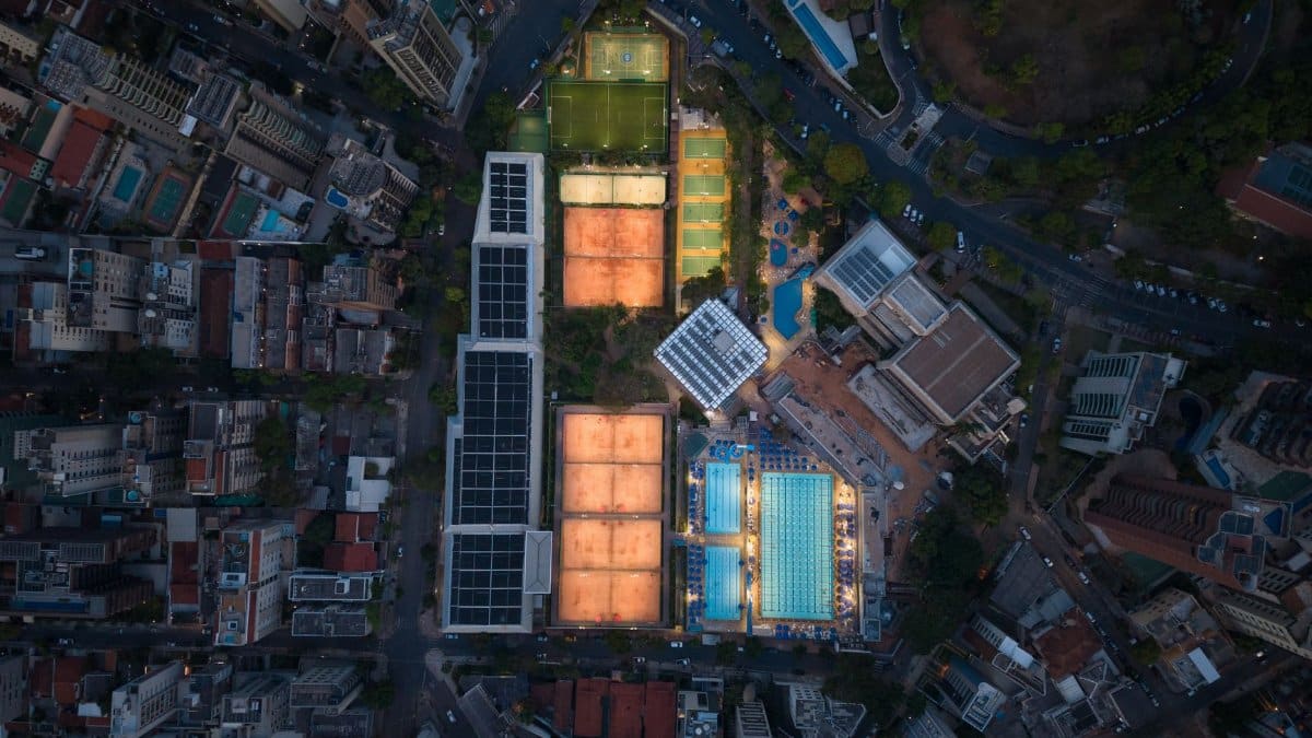 A stunning aerial view of a sports complex in Belo Horizonte, showcasing urban architecture and vibrant facilities.