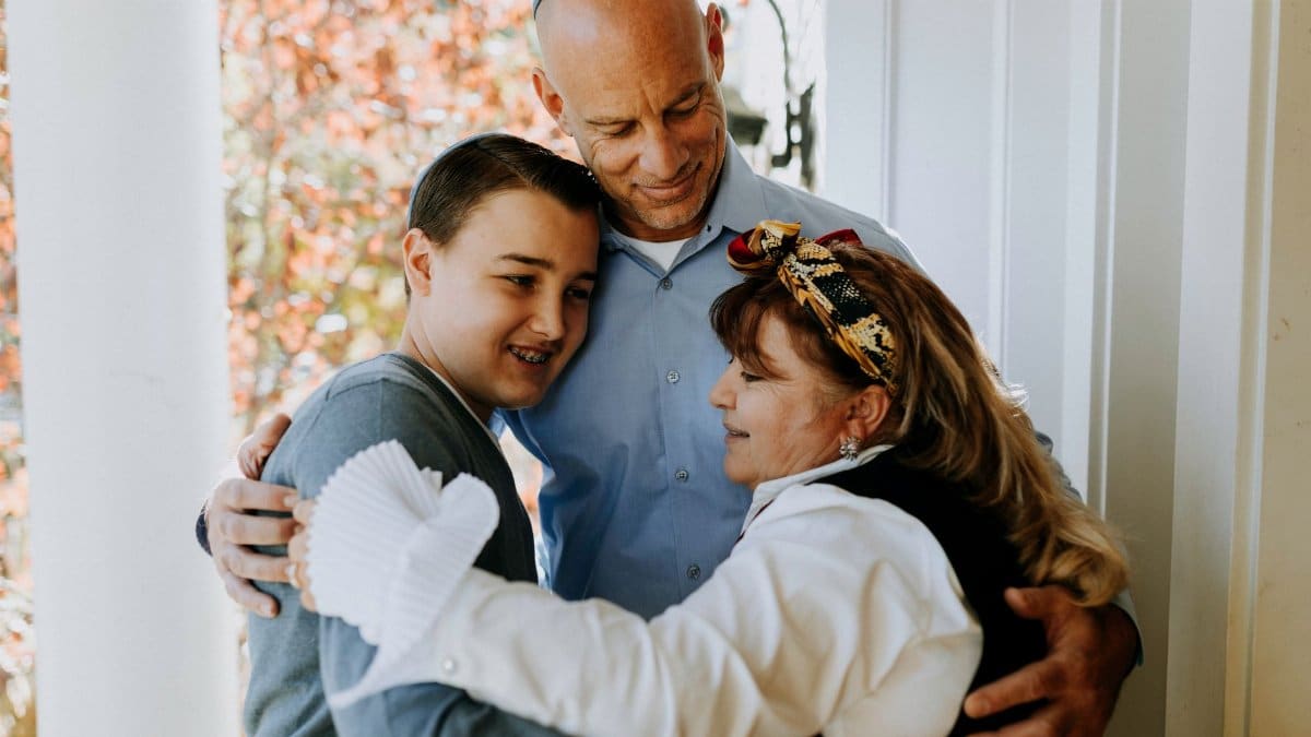 A heartwarming family moment of love and unity in Jewish tradition.