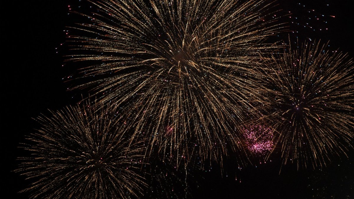 Stunning fireworks illuminate the night sky, perfect for festive celebrations.