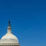 Stunning view of the US Capitol Dome in Washington, DC, with clear blue sky.