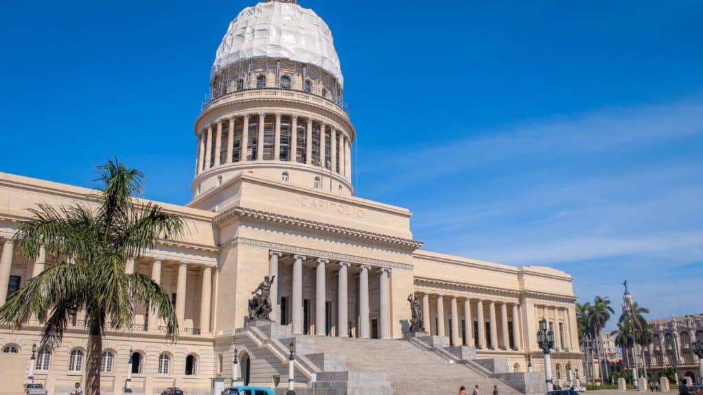 The stunning El Capitolio building in Havana, Cuba, under blue skies captures historical Cuban architecture.