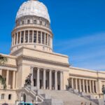 The stunning El Capitolio building in Havana, Cuba, under blue skies captures historical Cuban architecture.