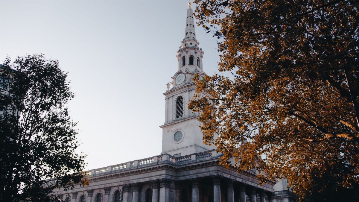 A beautiful capture of St Martin-in-the-Fields church in London during autumn.