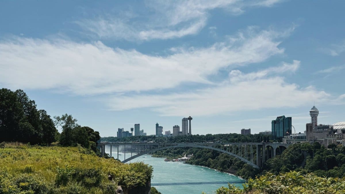 Scenic view of the Rainbow Bridge and skyline near Niagara Falls.