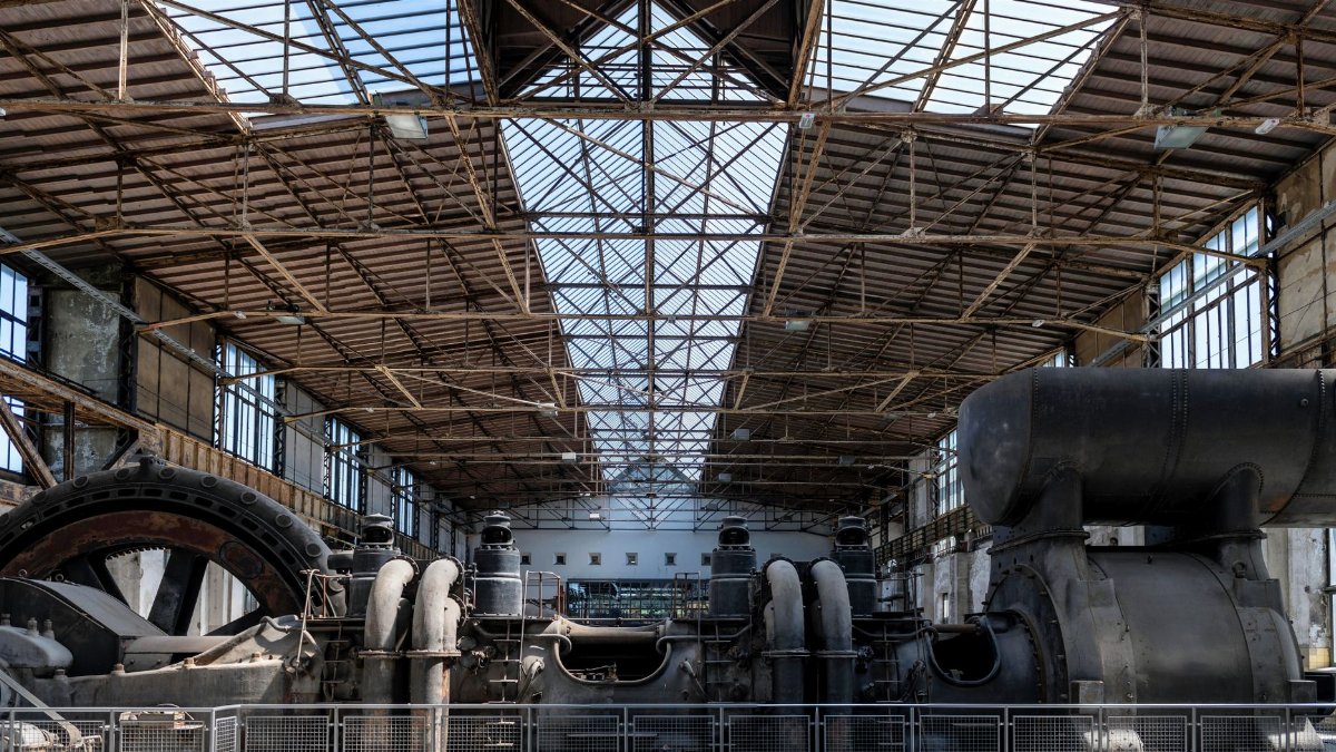 Interior view of a historic industrial facility in Hattingen, showcasing vintage steel equipment.