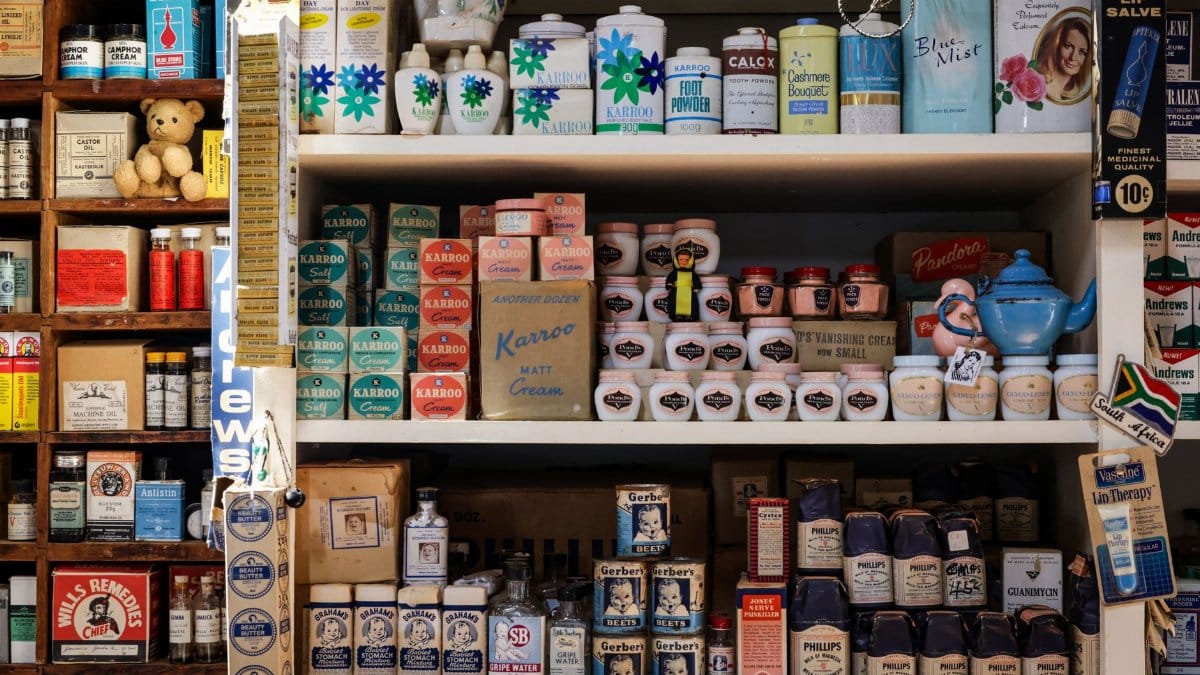 Retro grocery store shelves filled with vintage packaging and products.