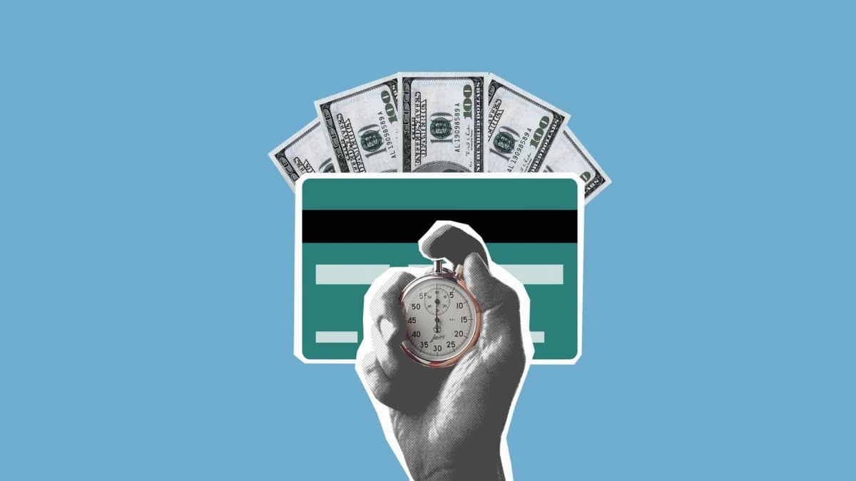Cut out paper composition of stopwatch in hand of man waiting for money credited to credit card on blue background