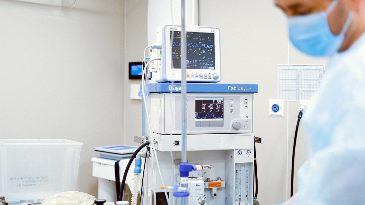 Close-up of advanced medical equipment in a sterile operating room setting.