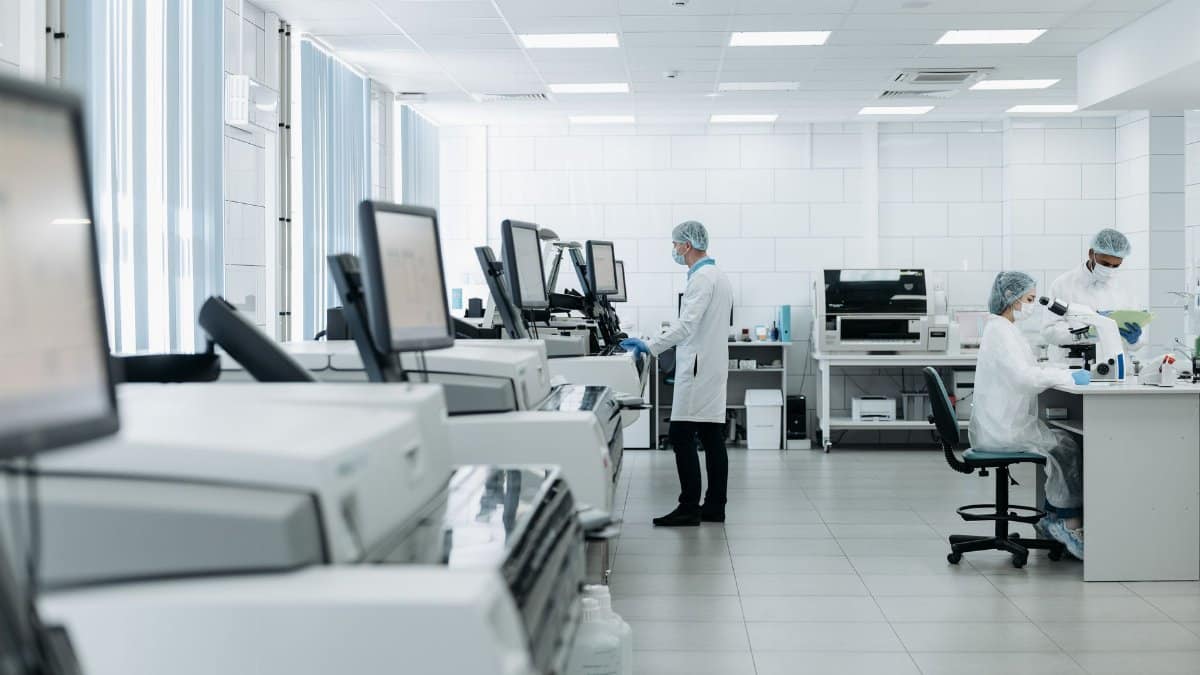 Scientists conducting research in a state-of-the-art laboratory with advanced equipment.