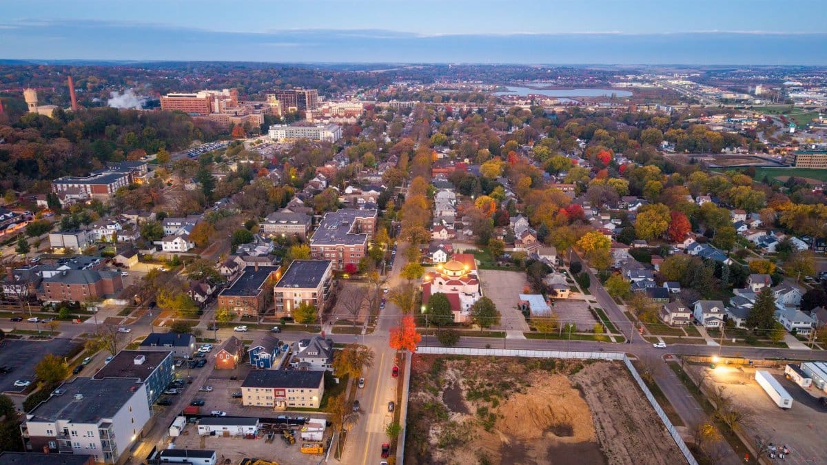 Stunning aerial view of Rochester, Minnesota's colorful autumn landscape at sunset.