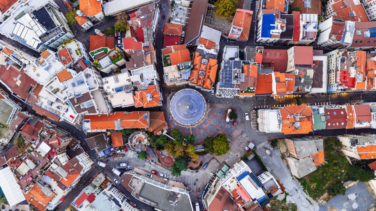 Captivating aerial view of a bustling Istanbul neighborhood, showcasing vibrant rooftops and city layout.