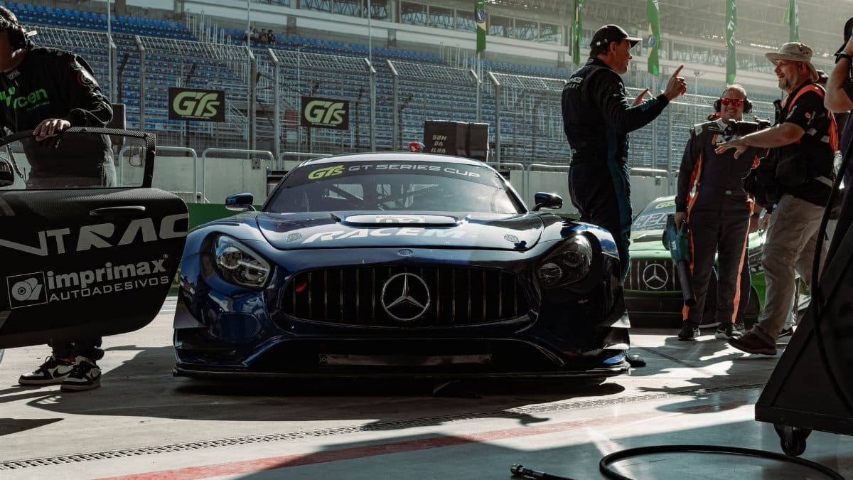 GT Series Cup race car and team preparing for the race on the track.