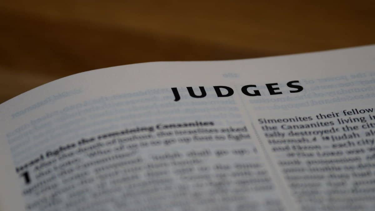 Intimate view of the Book of Judges, highlighting scripture text.