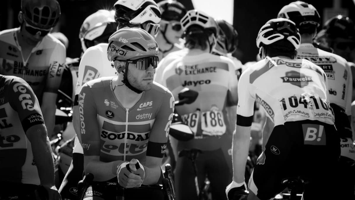 Cyclists gather before a thrilling race in this monochrome capture.