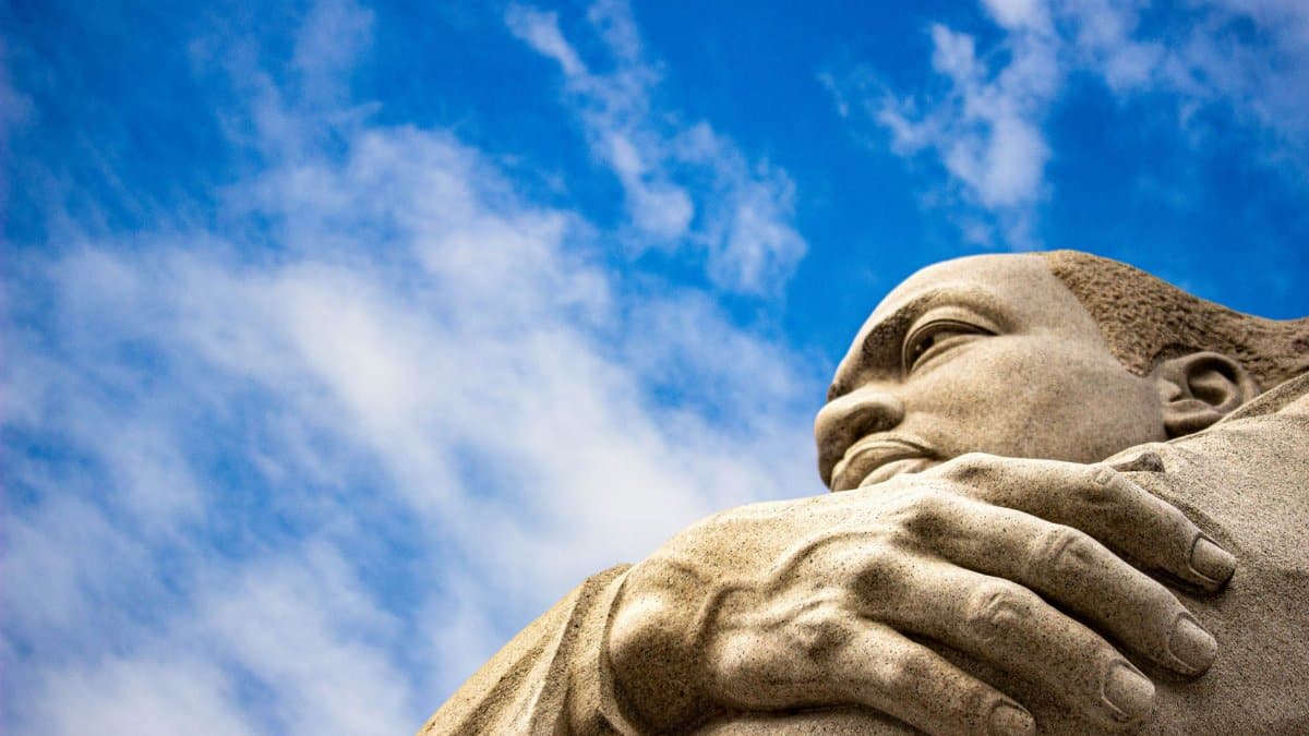 Close-up of the Martin Luther King Jr. Memorial statue against a blue sky in Washington, D.C.