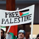 Protesters in Jönköping advocate for Free Palestine with visible signs.