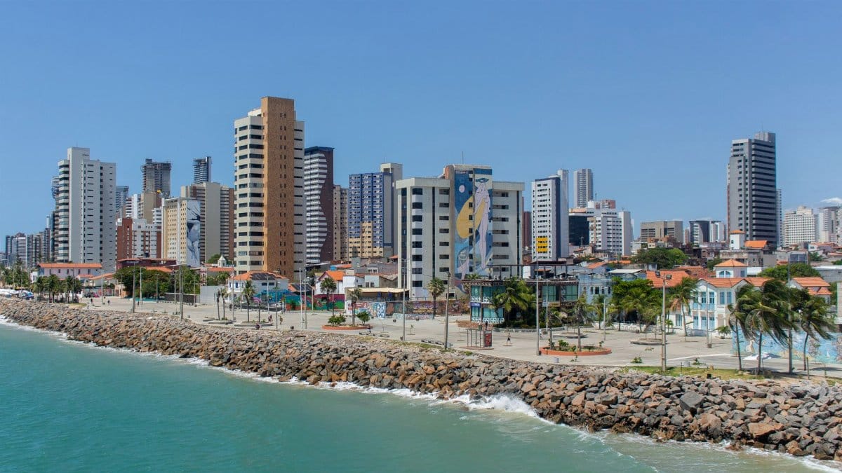 Scenic view of Fortaleza's coastal skyline in Ceará, Brazil with tall modern buildings.