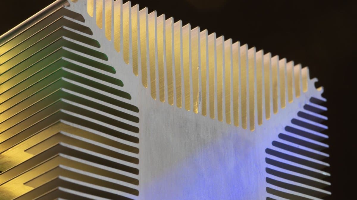 Detailed view of a metallic heat sink showcasing technological design.